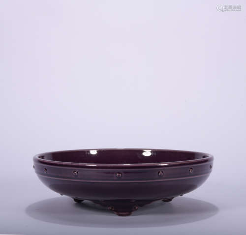 A purple glazed bowl