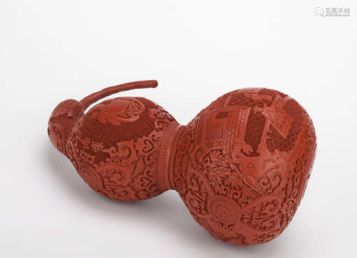 A carved 'landscape' lacquerware gourd ornament