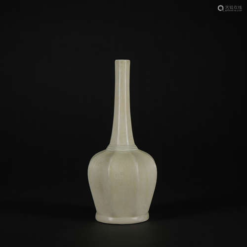 A celadon-glazed vase