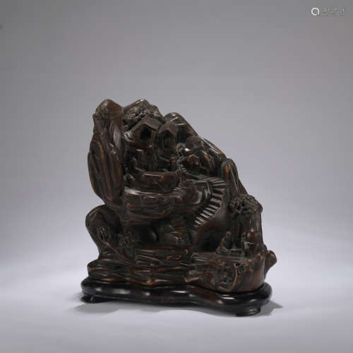 A red sandalwood figure and mountain