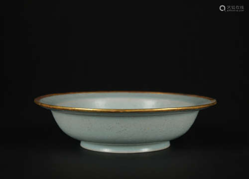 A celadon-glazed dish