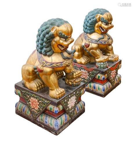 PAIR OF PAINTED GILT WOOD FOO LIONS