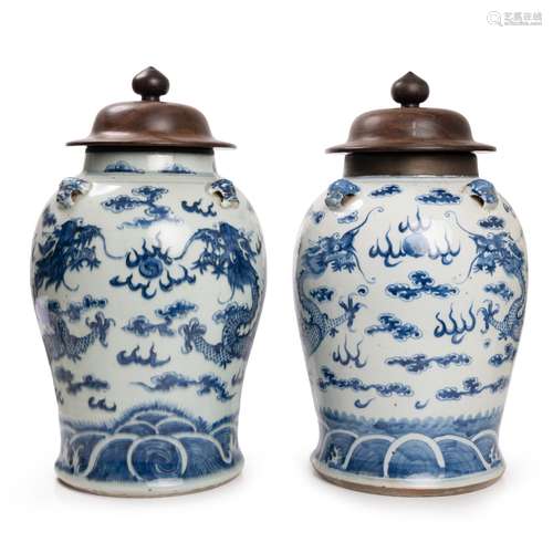 PAIR OF BLUE AND WHITE DRAGON JARS WOOD LIDS