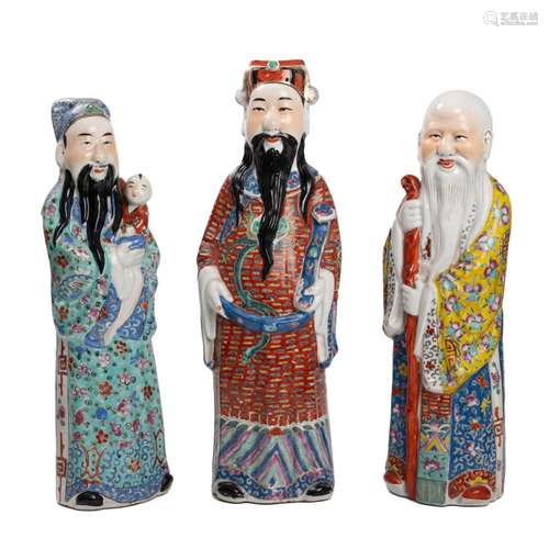 THREE CHINESE PORCELAIN FU LOU SHOU FIGURES