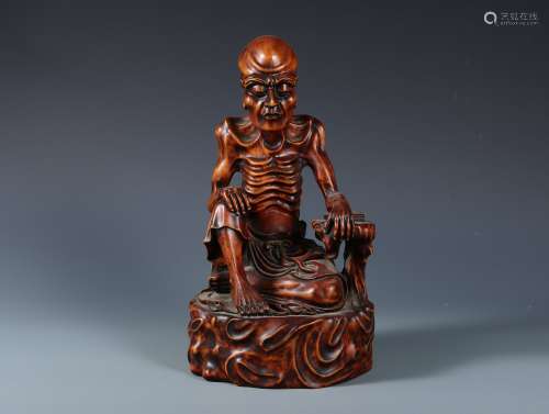 A Carved Boxwood Seated Arhat