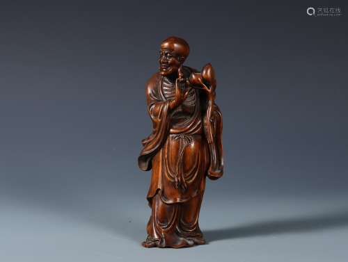A Carved Boxwood Standing Arhat