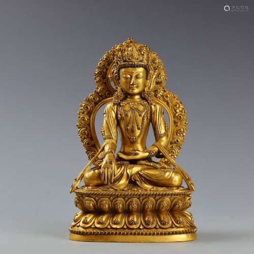 A Bronze-gilt Seated Buddha