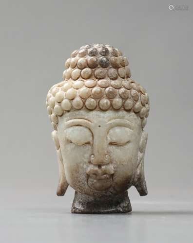 A Carved Jade Buddha Head
