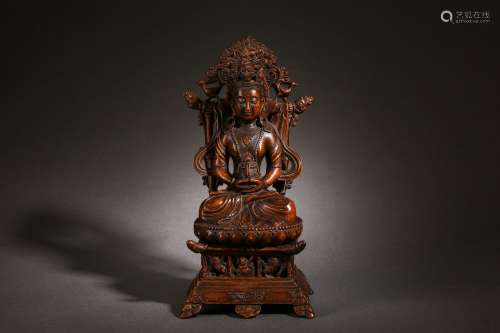 A Carved Aloes-wood Seated Avalokitesvara