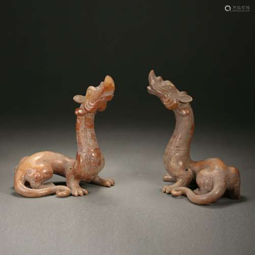 Pair Carved Russet Dragons