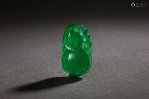 A Carved Jadeite Pendant