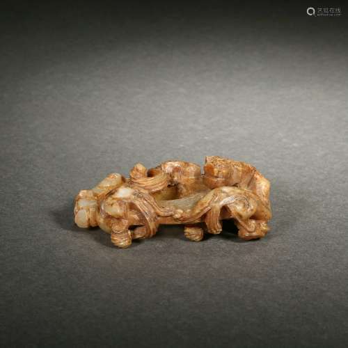 A Carved Russet Jade Ornament