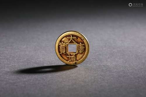 A Bronze-gilt Chinese Coin