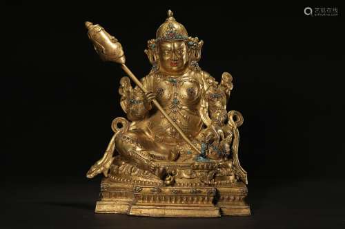 A Bronze-gilt Jambhala