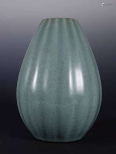 A Celadon Glazed Lobed Jar