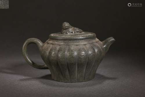 A Yixing Glazed Teapot with Beast Finial