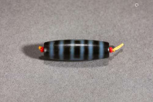 A Tibetan Dzi Bead