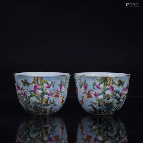 A Pair of Famille Rose Bats and Peaches Cups