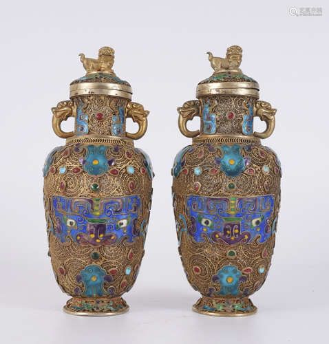 A Pair of Filigree Elephant Handles Vases