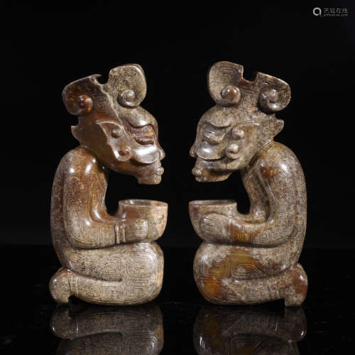 A Pair of Zhou Dynasty Jade Figure