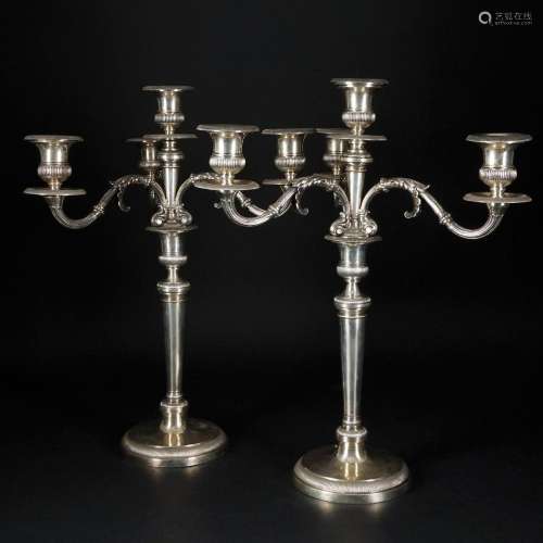 A pair of Italian silver dual-use four-light candelabra, Tur...