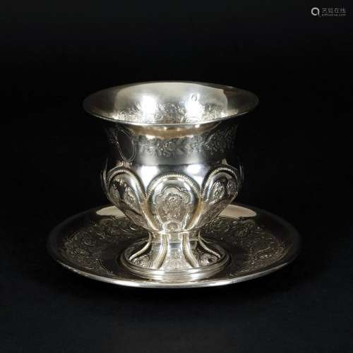 A French silver cup and saucer, 19th century