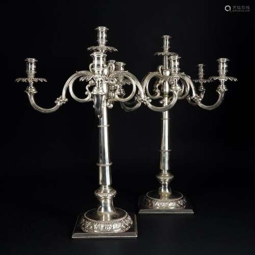 A pair of silver five-light candelabra