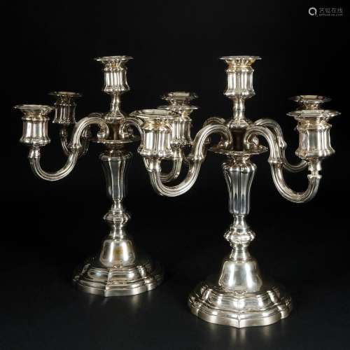 A pair of silver five light candelabra