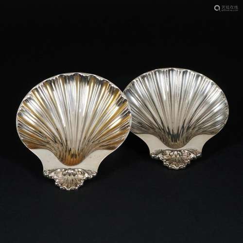 A pair of silver shell bowls