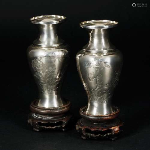 A pair of Chinese small silver vases, early 20th century