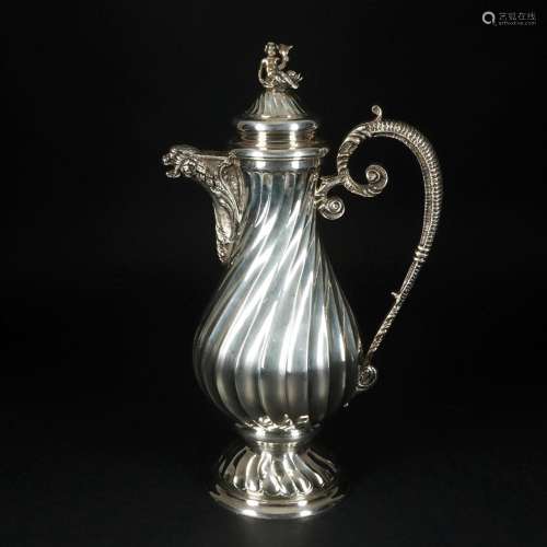 A silver large coffee pot