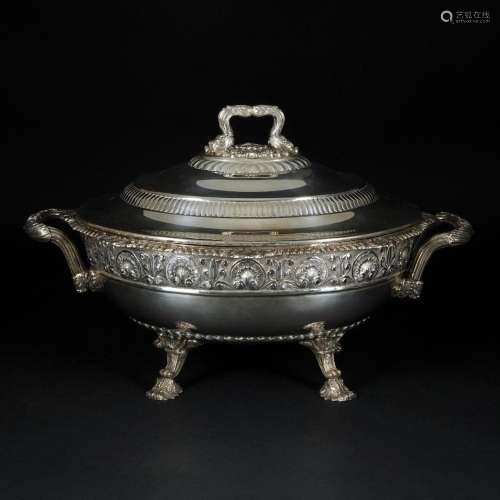 An embossed silver gilt oval tureen and cover
