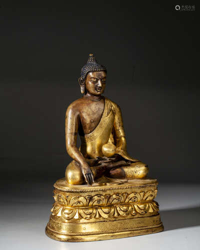 A GILT-BRONZE FIGURE OF SAKYAMUNI