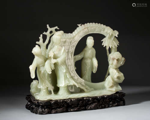 A CARVED WHITE JADE DECORATION WITH STAND,QING DYNASTY