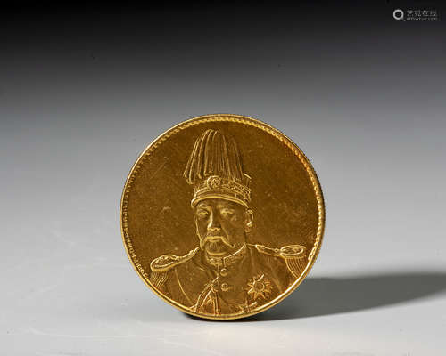 A CHINESE GOLD COIN