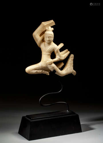 A MARBLE FIGURE OF FLYING APSARAS,NORTHERN QI DYNASTY