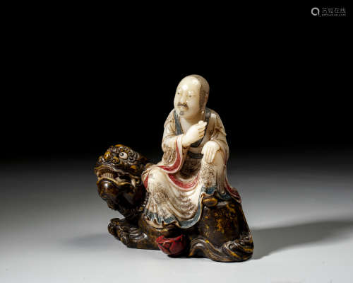 A SOAPSTONE FIGURE OF A LUHAN,QING DYNASTY