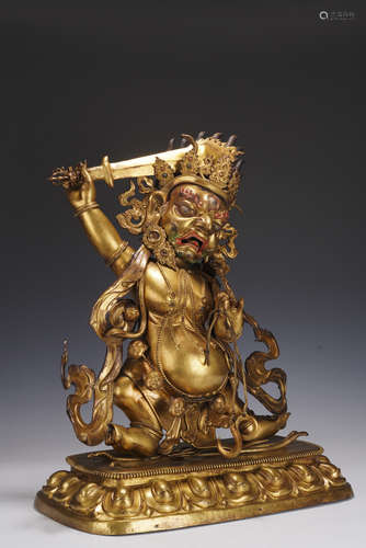 A GILT-BRONZE FIGURE OF DHARMAPALA,QING DYNASTY