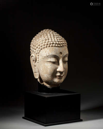 A STONE HEAD OF BUDDHA