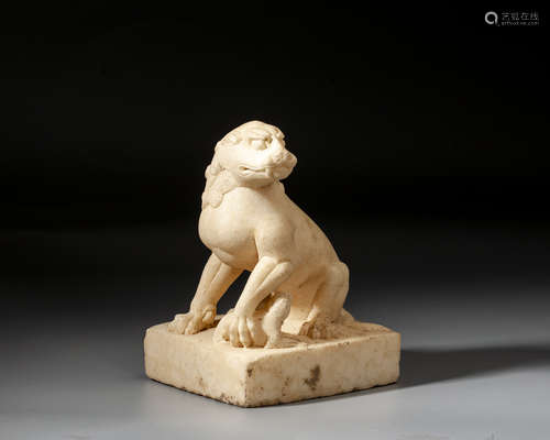 A MARBLE FIGURE OF A SEATED LION,TANG DYNASTY