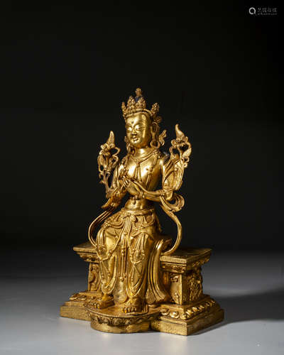 A GILT-BRONZE FIGURE OF MAITREYA