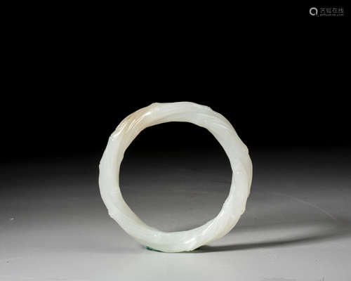 A CHINESE WHITE JADE BANGLE