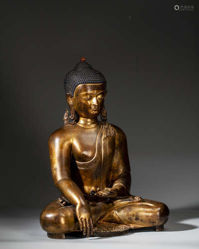 A GILT-BRONZE FIGURE OF SAKYAMUNI