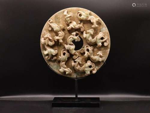 Chinese Hardstone Carved Wheel Depicting Mythical Beasts