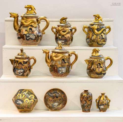 A group of early 20th century Japanese satsuma teapots, suga...