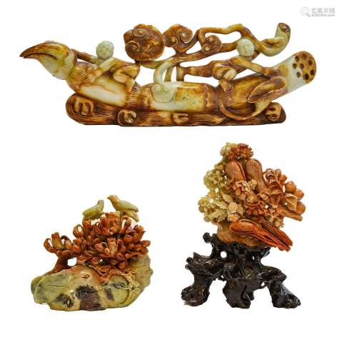 Three large 20th century Oriental soapstone carvings, one de...