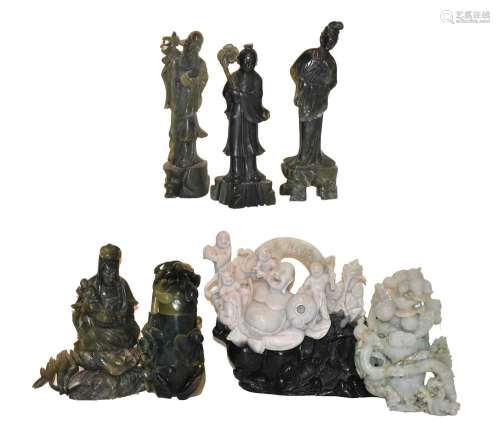 A small group of 20th century Chinese green hardstone carvin...