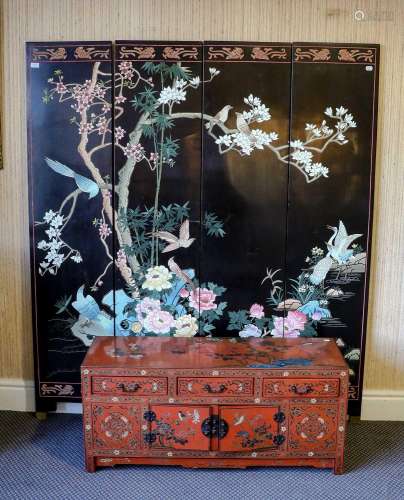 A Chinese four-fold screen painted with birds amongst boughs...