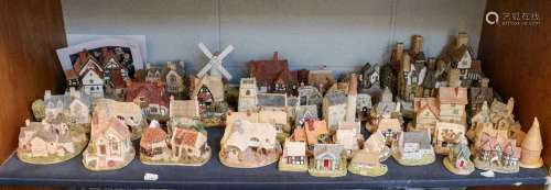 A collection of Lilliput lane cottages, including: Clockmake...