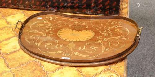 An Edwardian marquetry serving tray of patera design with a ...